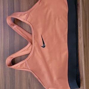 medium Nike copper and black sports bra